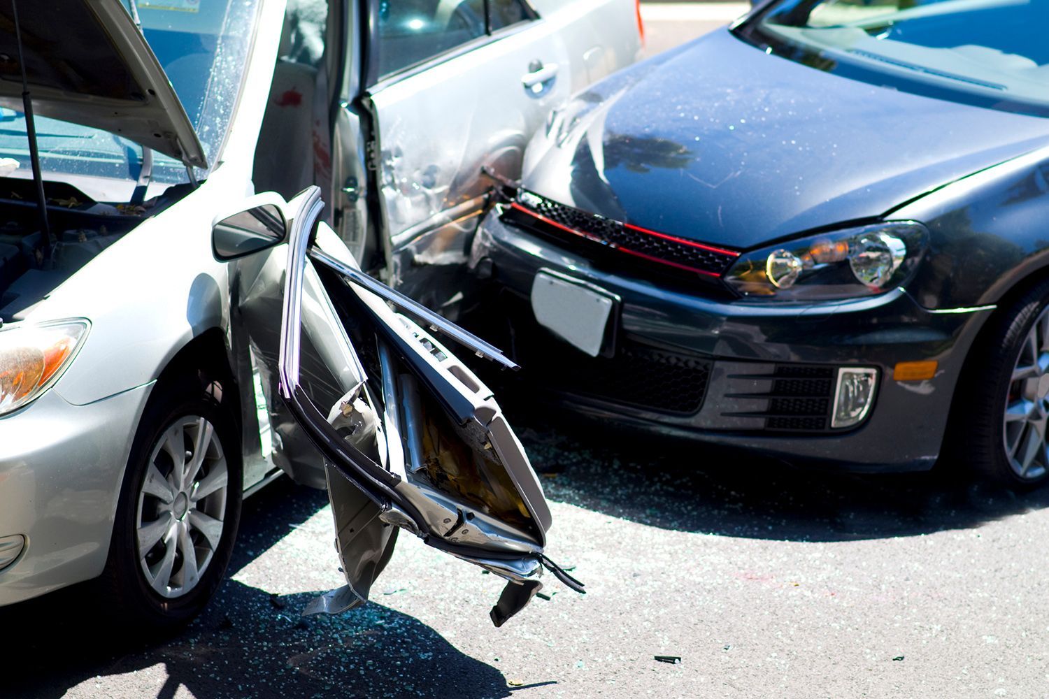 Photography of two car collision.