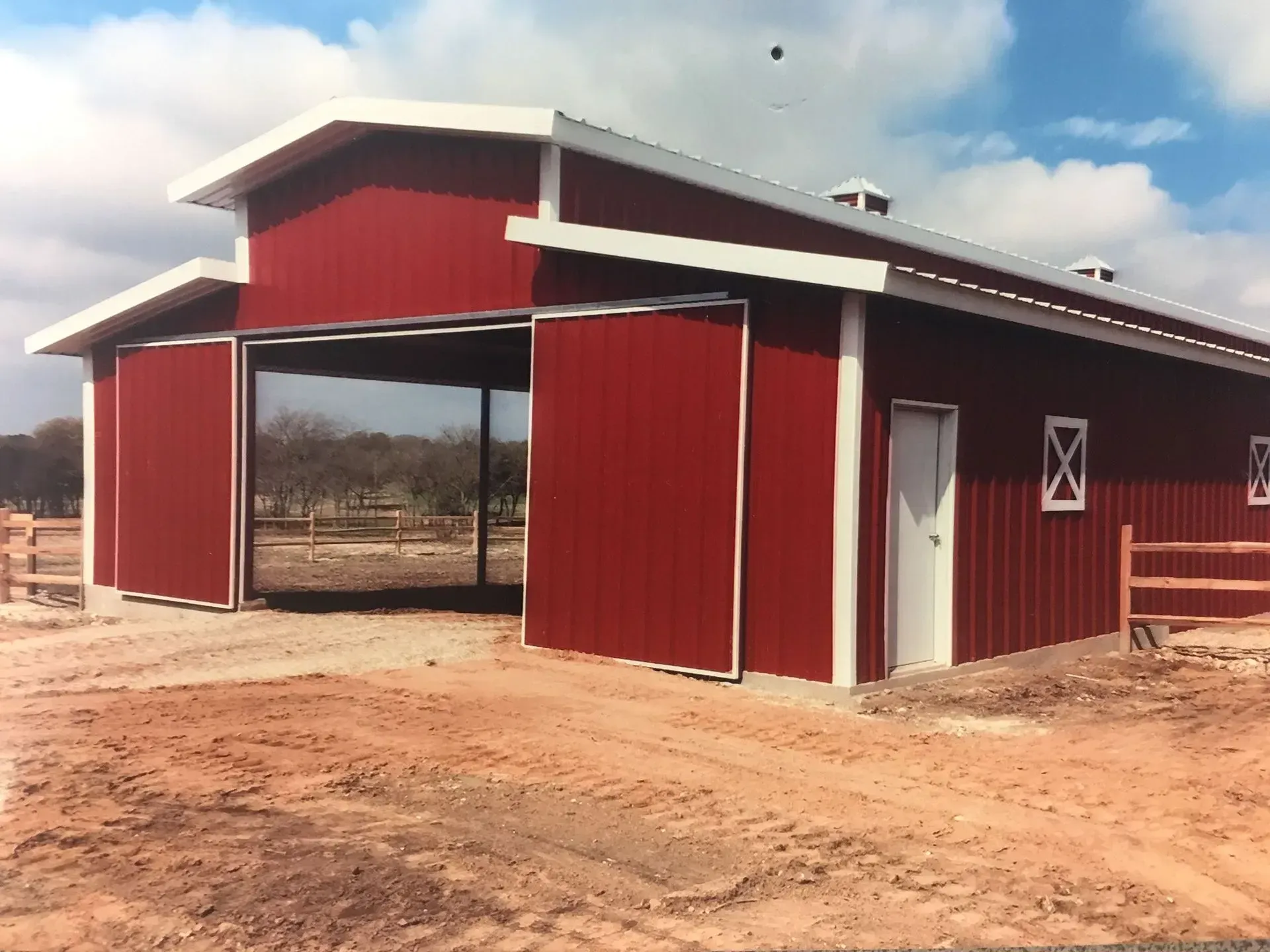 Red Barn With White Roof - Clifton, TX - Bosque Supply Company