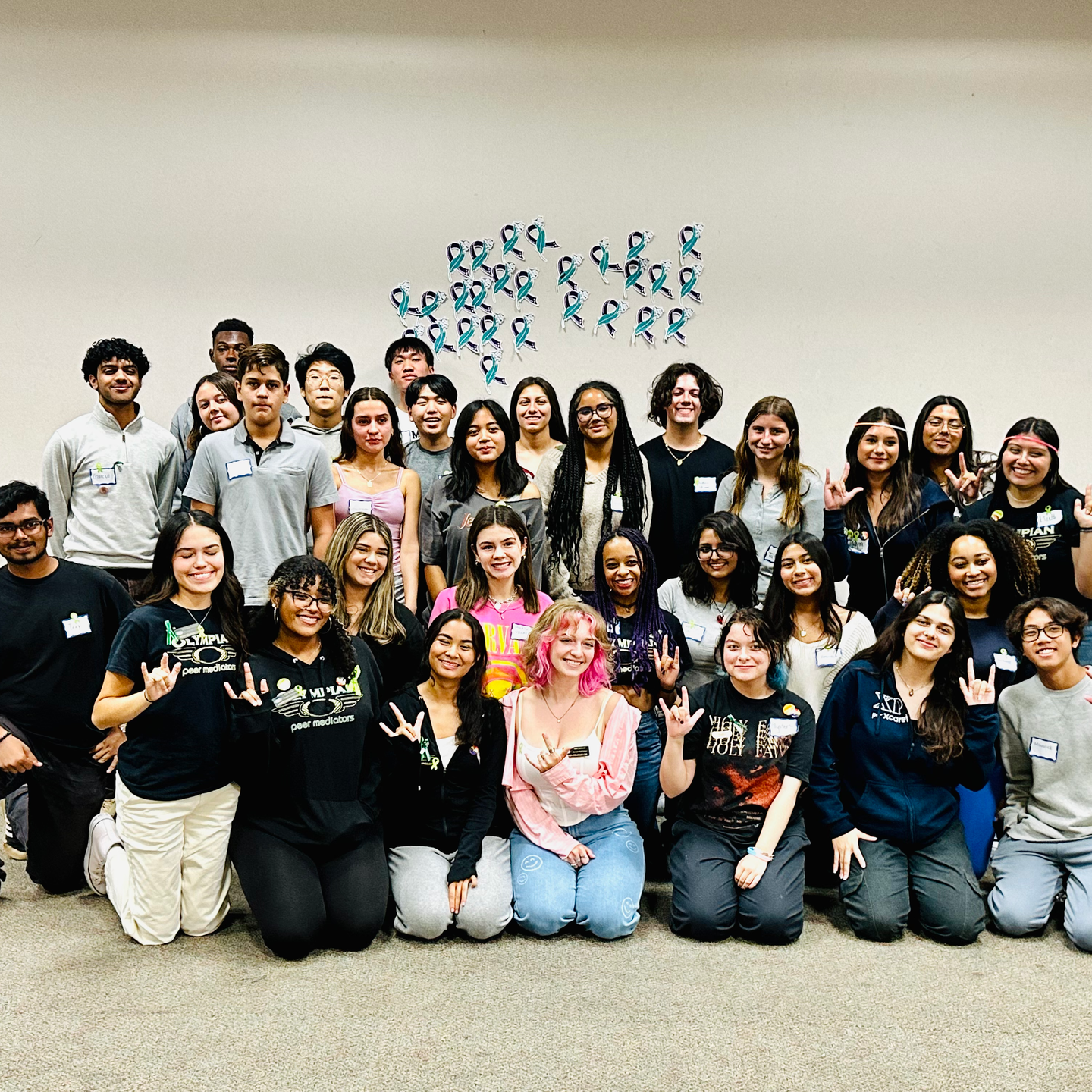 A large group of people are posing for a picture.