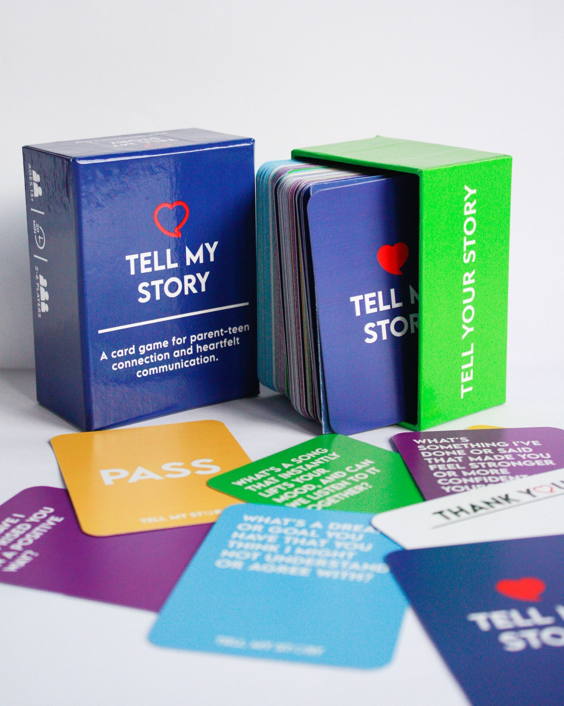 Two boxes of tell my story cards are sitting on a table