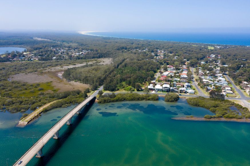 An Aerial View of a Bridge Over a Body of Water — Port Stephens Removals & Storage In Tea Gardens, NSW