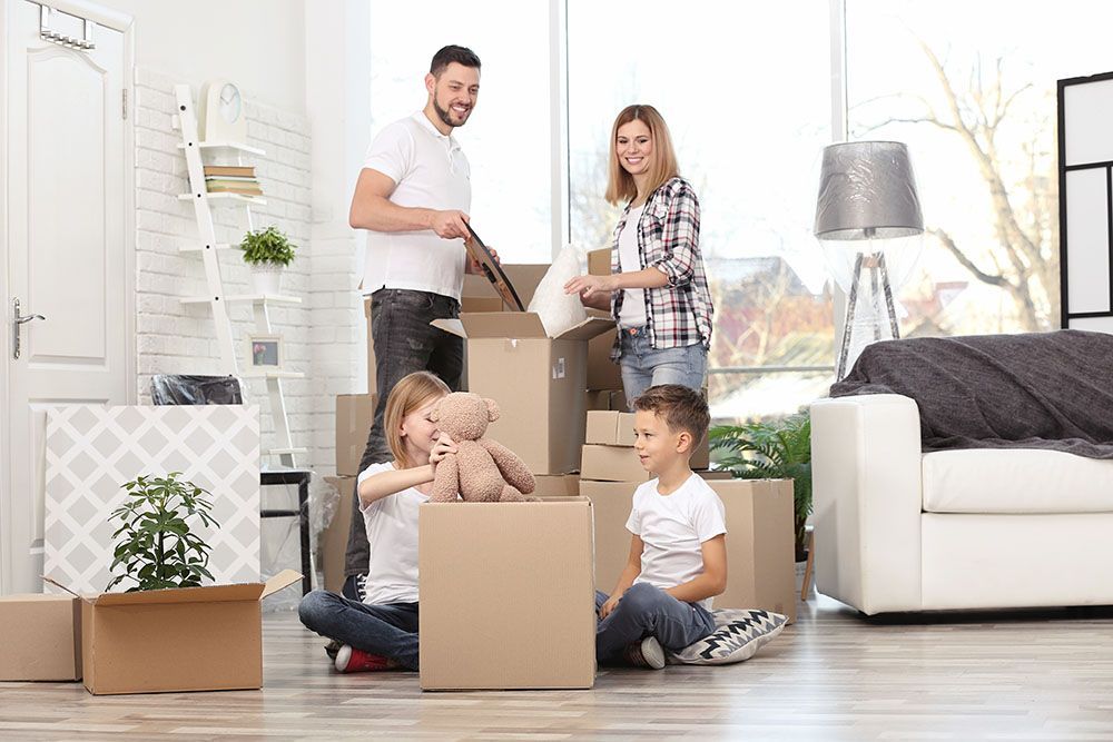 A Family is Moving Into a New Home  — Port Stephens Removals & Storage In Salt Ash, NSW