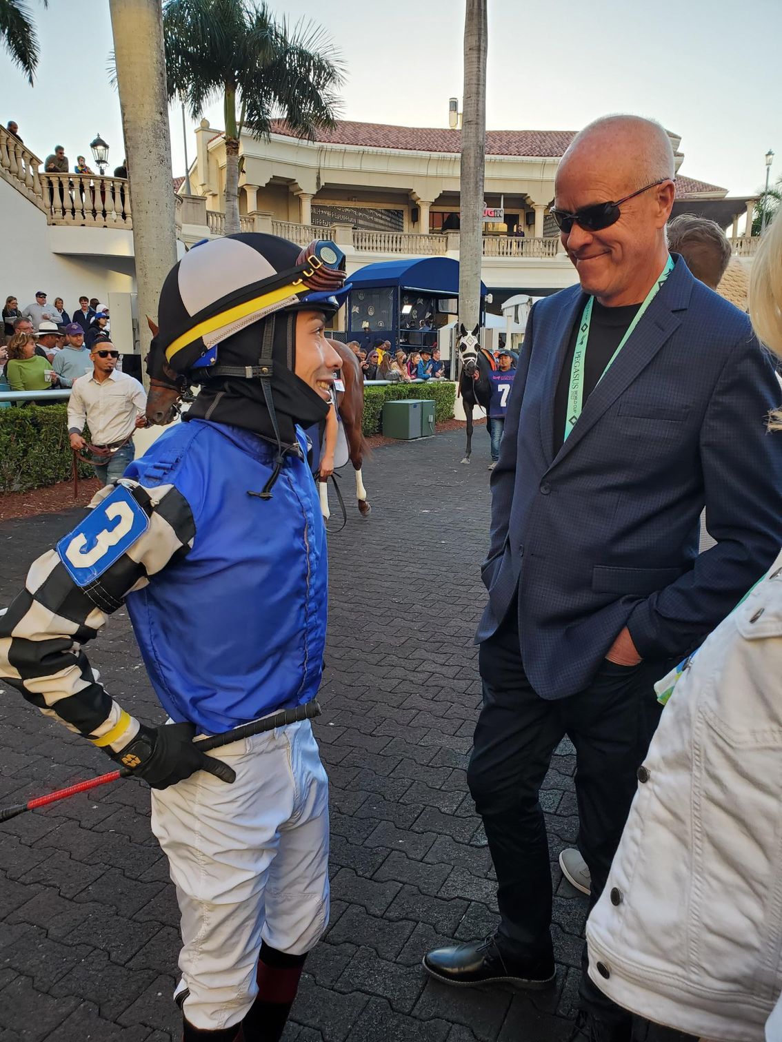 A jockey with the number 3 on his arm