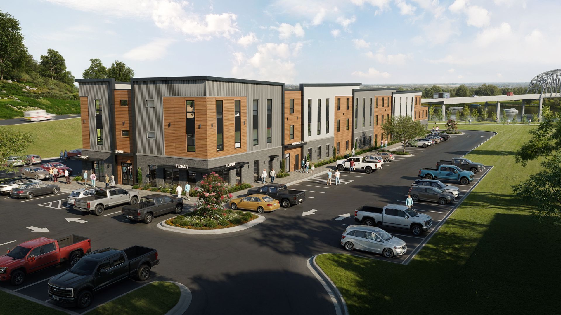 Modern commercial building with parking lot and cars; exterior view.