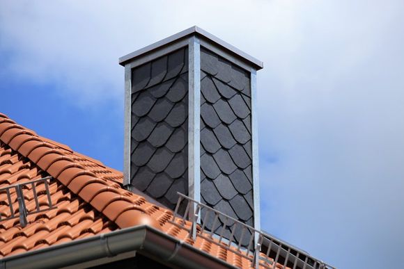 Chimney Installation Expert — New Tiled Roof With Chimney With Slate Cladding in Rohnert Park, CA
