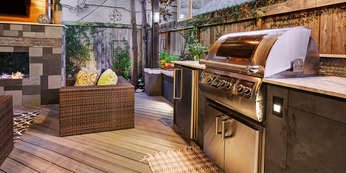 There is a grill in the middle of the kitchen.