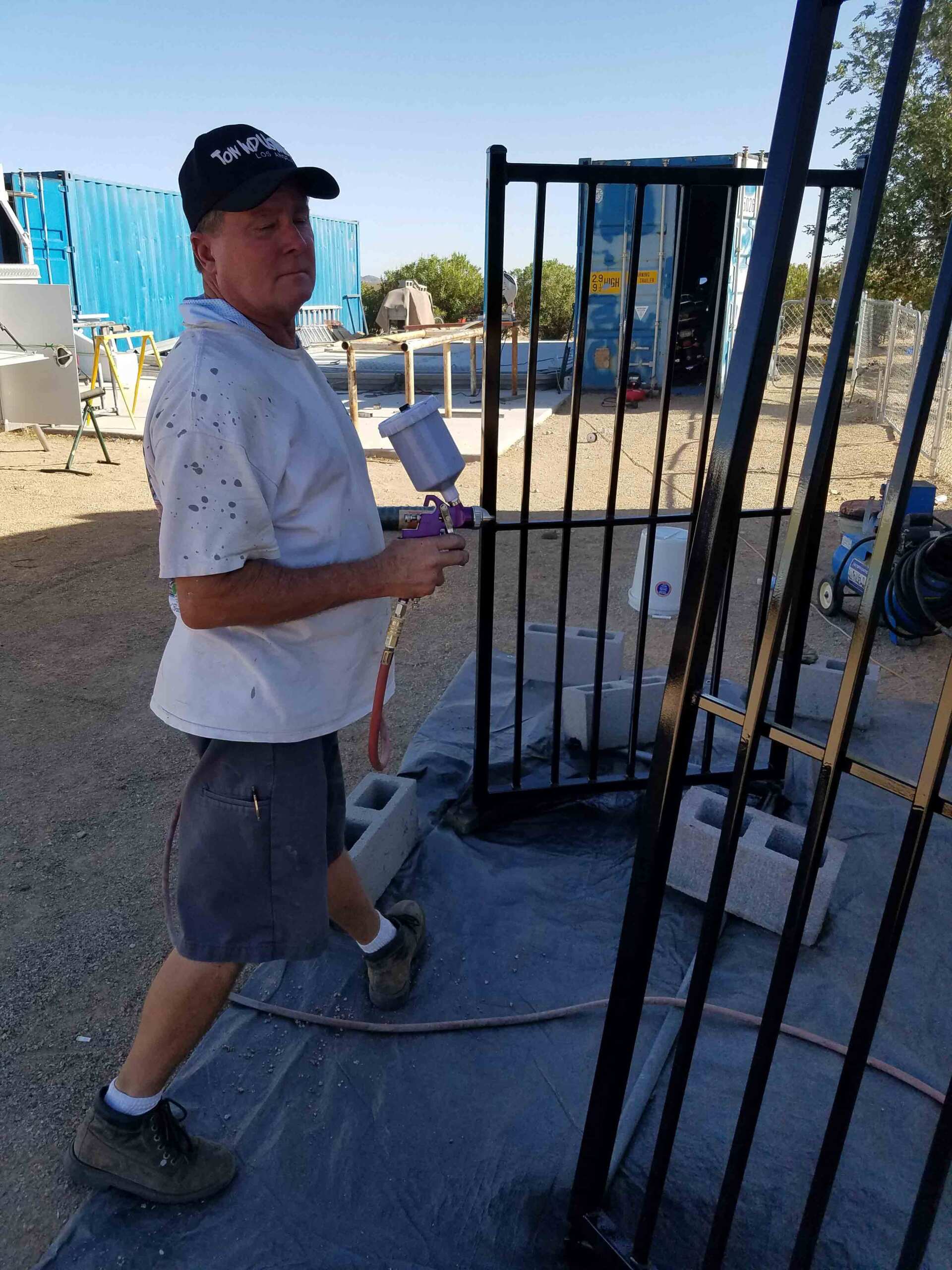 Modern Technology Staff Working on Wrought Iron Gates — Bullhead City, AZ — Modern Fence Technologies