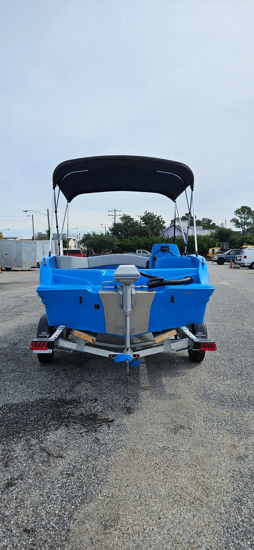 Blue Phantom plastic boat with canopy top - Back