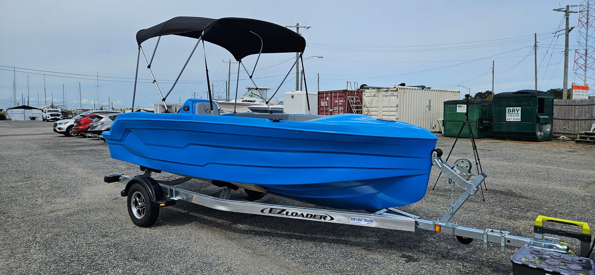 Blue Phantom plastic boat with canopy top - Front side sb