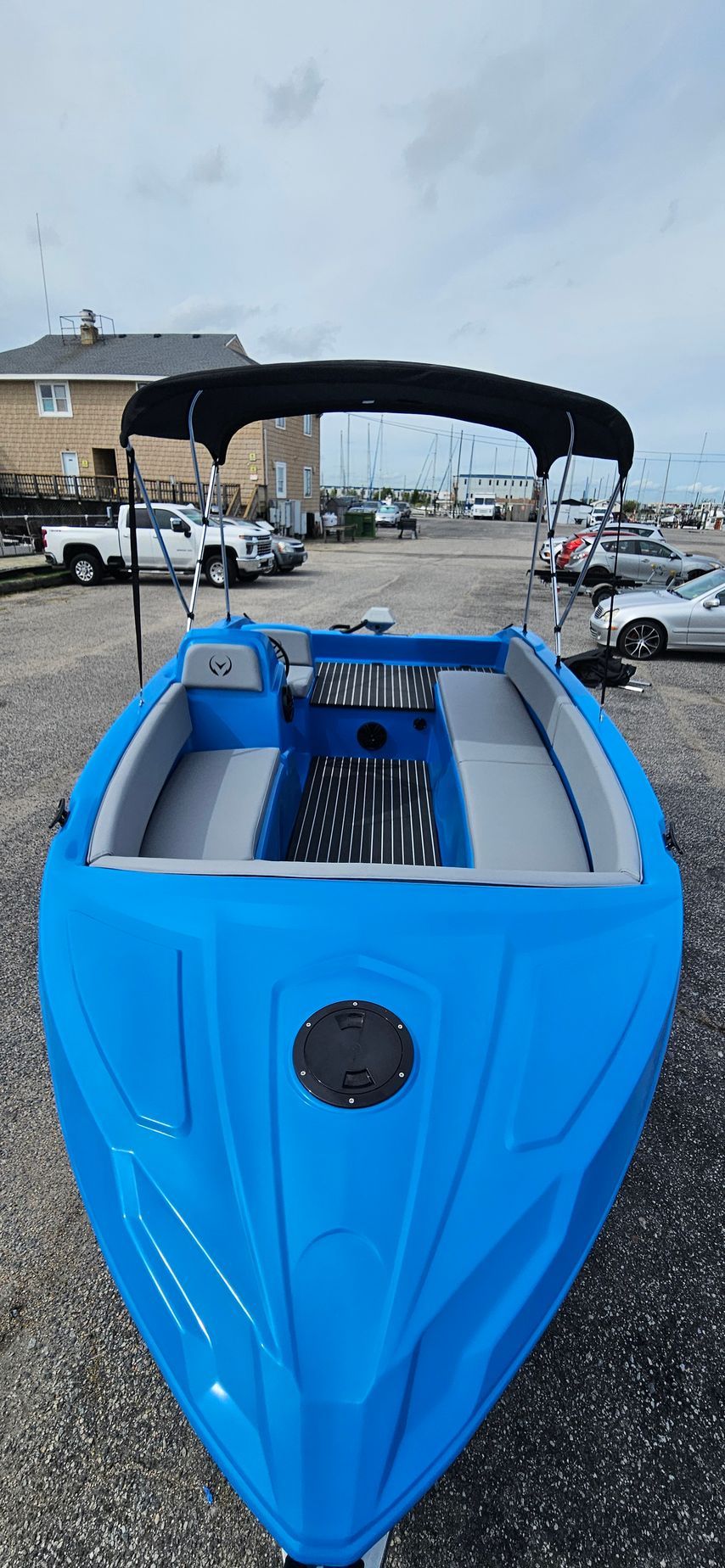 Blue Phantom plastic boat with canopy top - seating