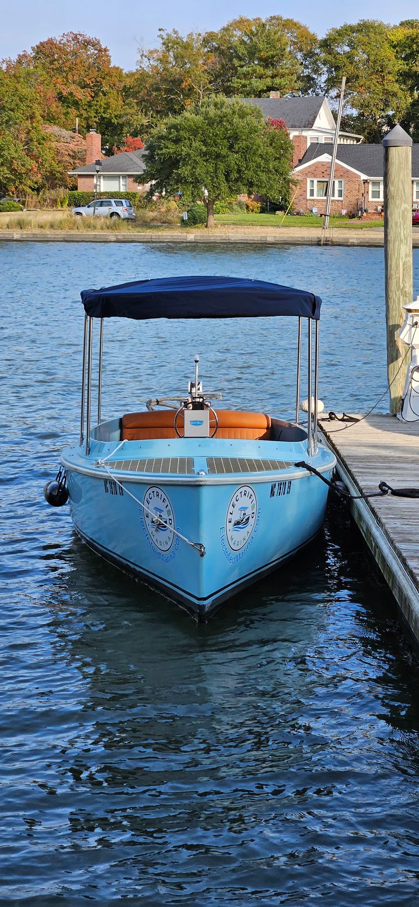 Blue Fantail boat with blue canopy top - Front 