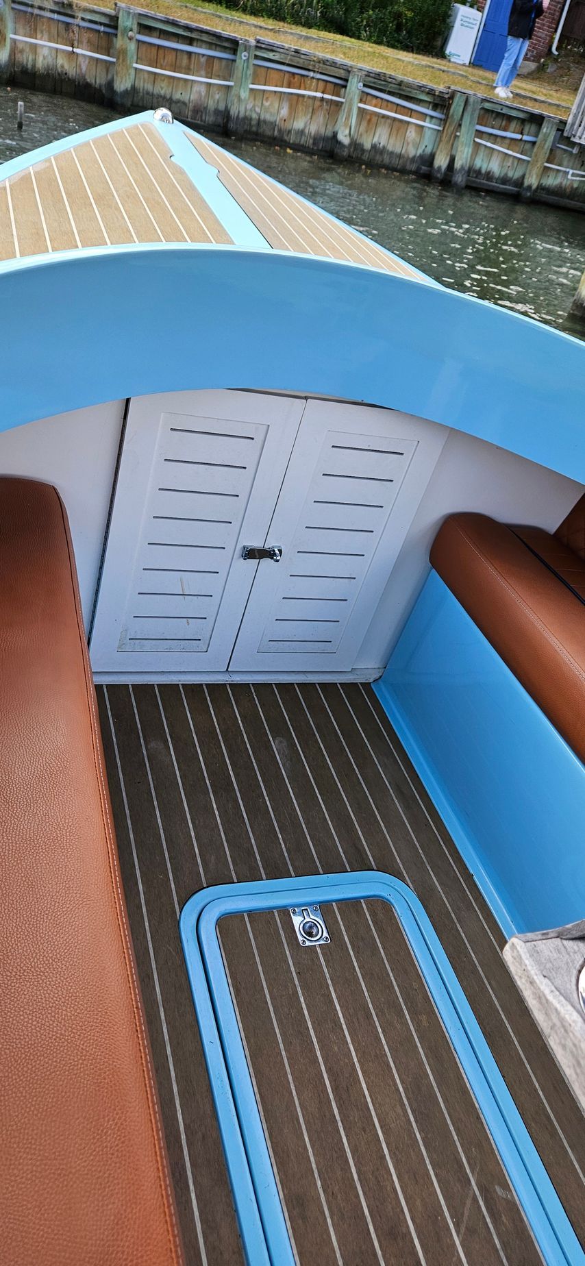 Blue Fantail boat with blue canopy top - storage