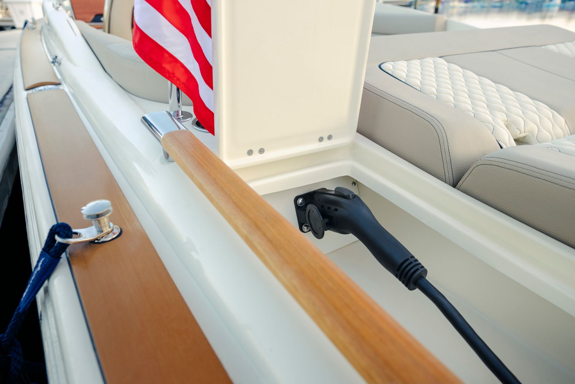 Ingenity boat with 2 ladies on the back transom 