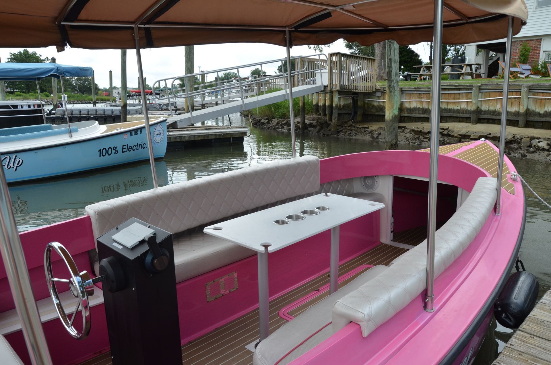 Pink Fantail boat with canopy top - Helm