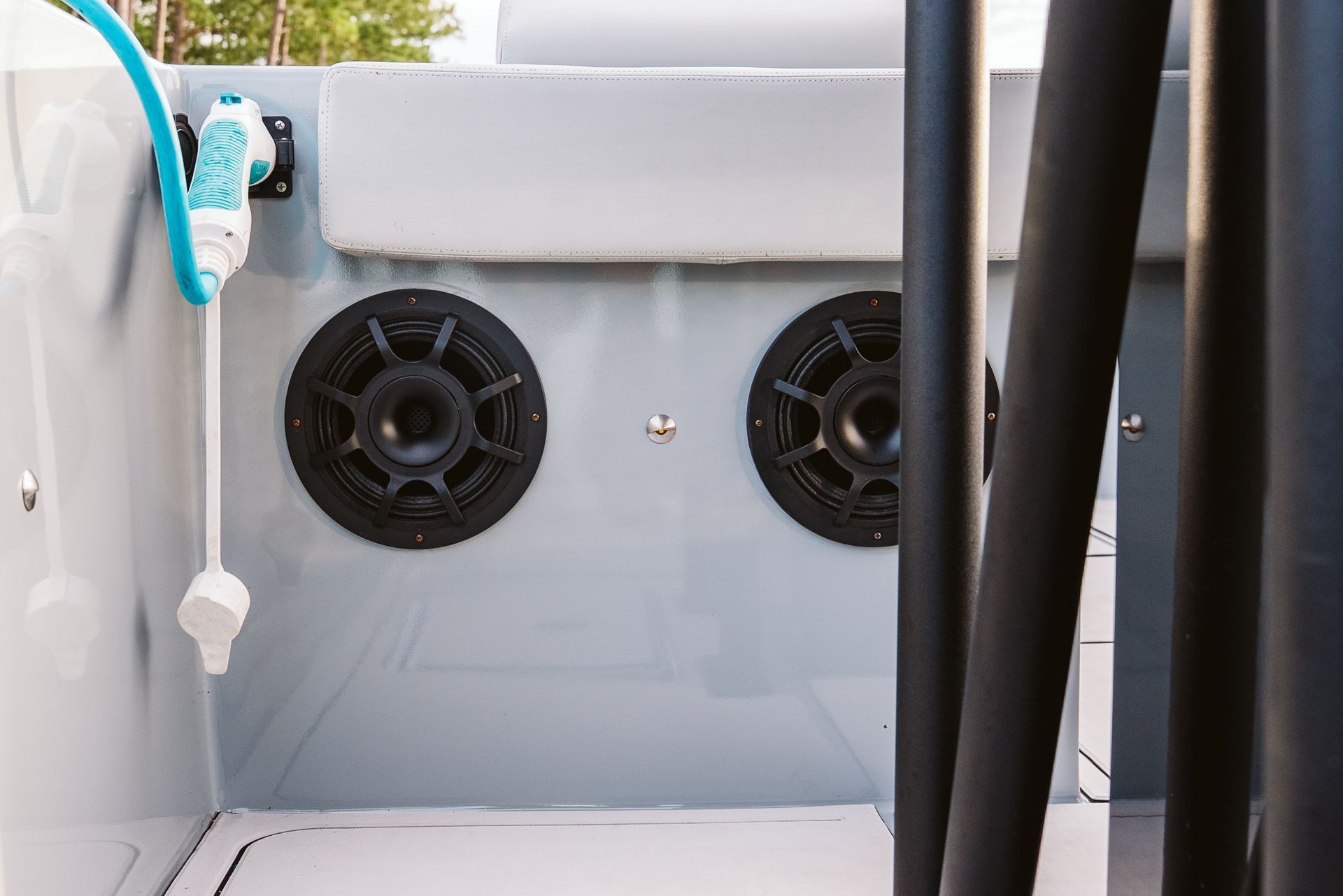 Two speakers on model2050 and electric charger charging electric boat Halevai