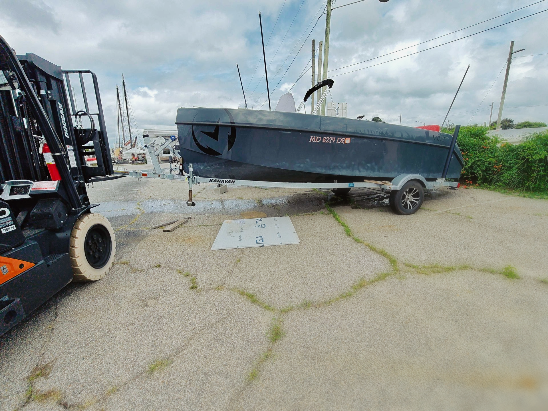 Volt grey being moved by fork lift at Willoughby Marina Norfolk VA