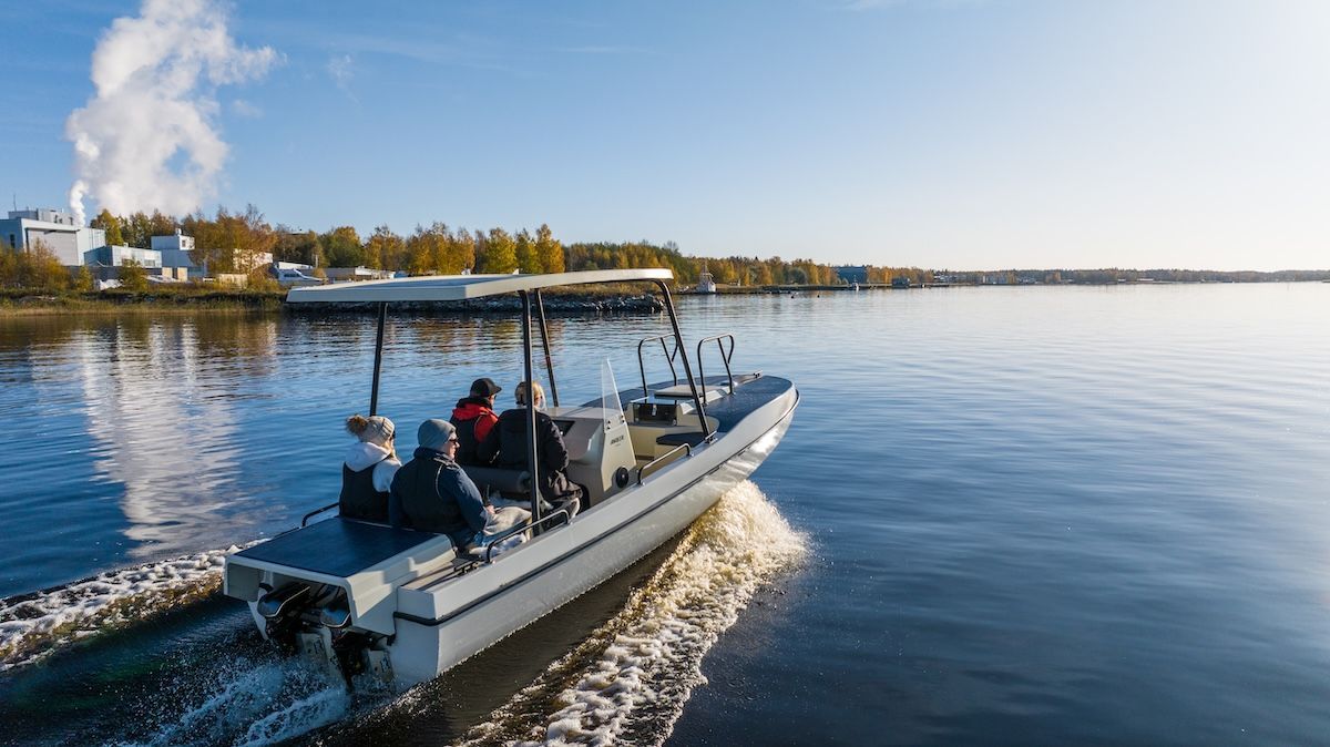 Boat headed towards the coast center console boat with solar panels for cruising 