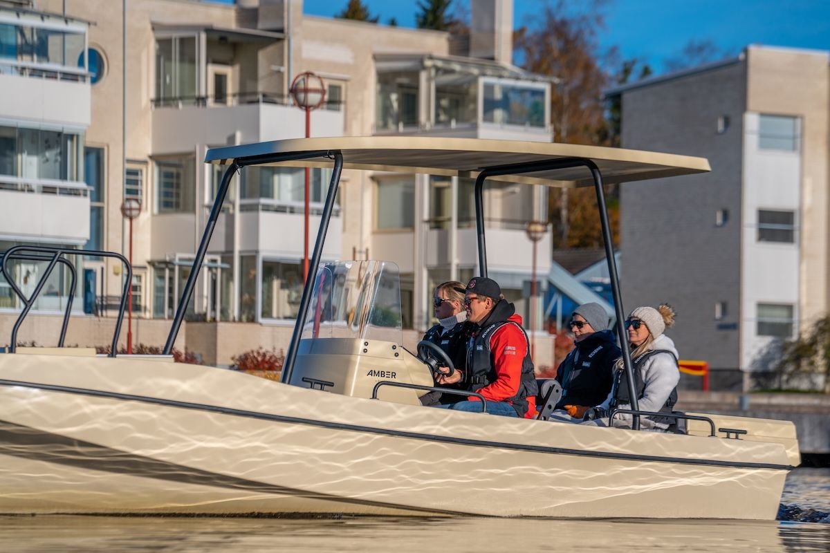 close up of Amber boat from Elvene center console pulling into dock 