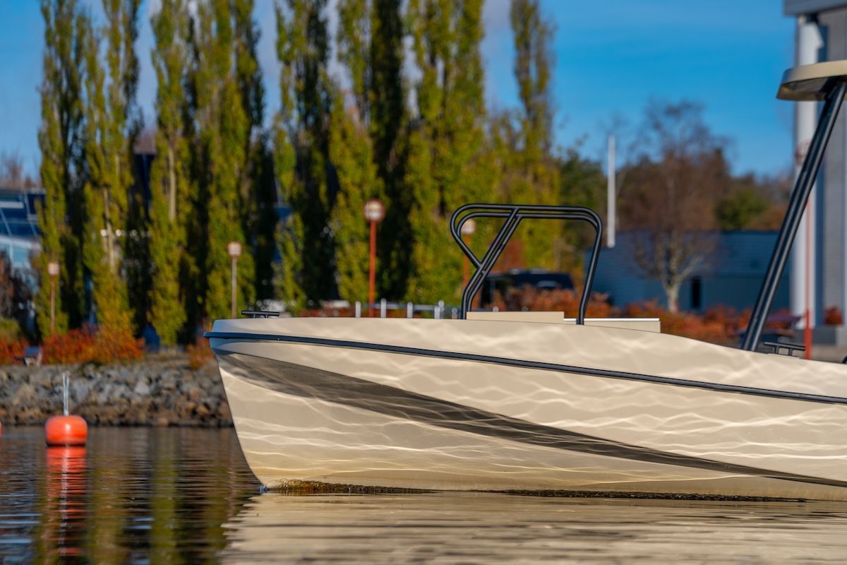 Ingenity; boat with riders in the bow 