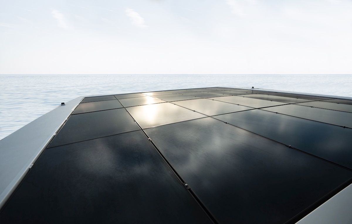 Solar panels on top of yacht over looking water