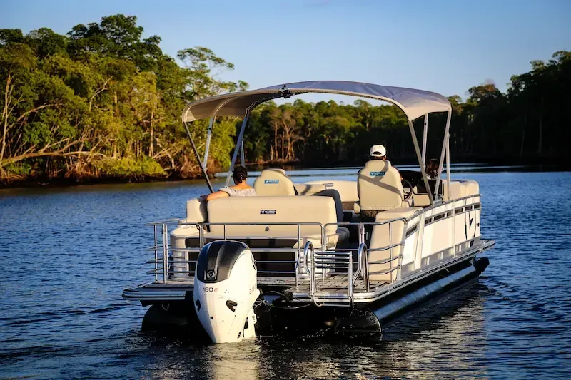 V30 pontoon from Vision Marine 180HP electric pontoon electric deck boat in water