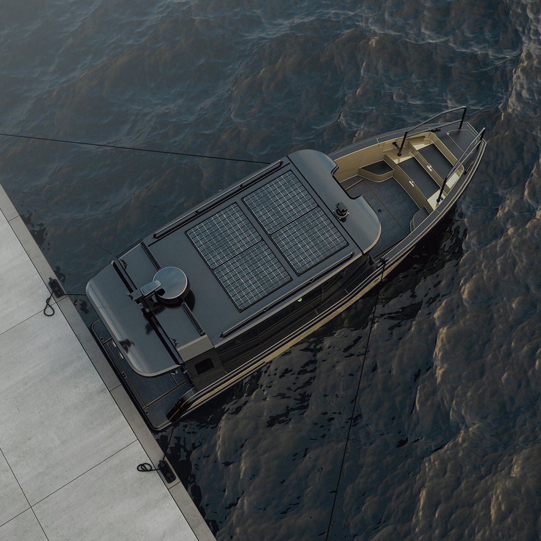 A white boat is floating on top of a body of water.