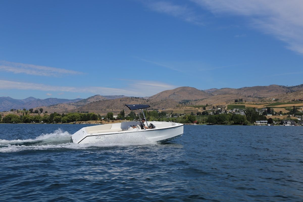 Ingenity; boat with riders in the bow 
