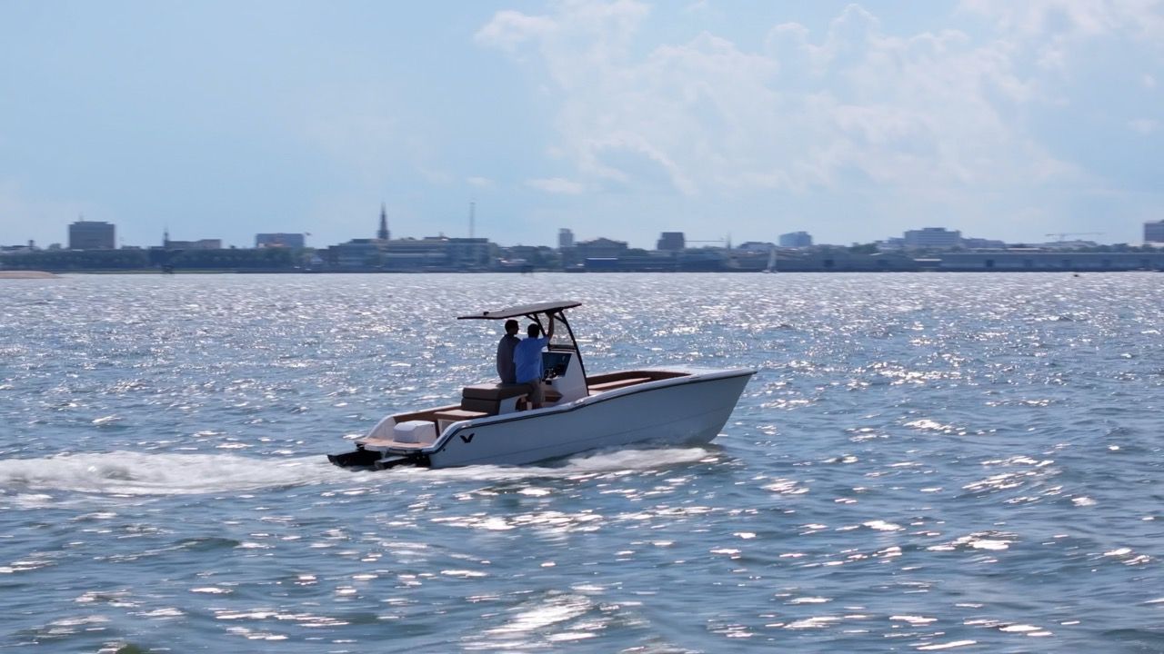Volare Artemis23 electric catamaran center console in water