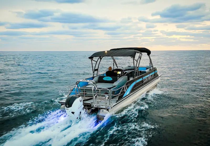 V30 pontoon from Vision Marine 180HP electric pontoon electric deck boat in water