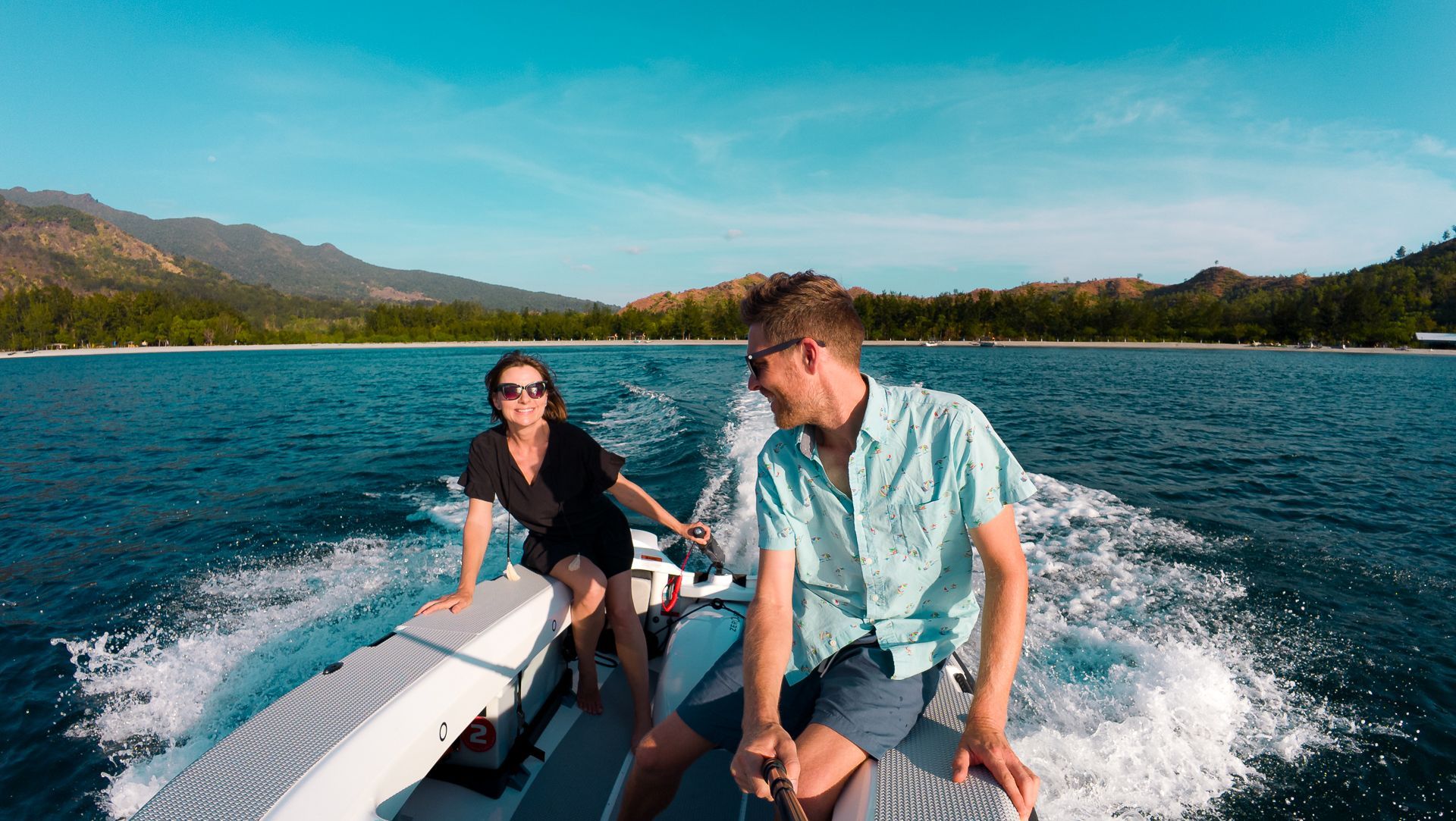 Couples riding the ZeroJet Powered OC tender  in the ocean