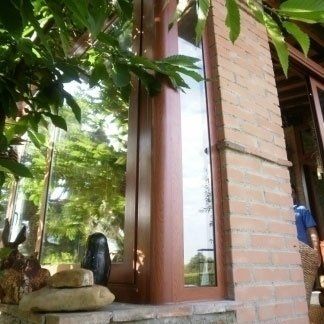 abitazione con infissi in legno -alluminio