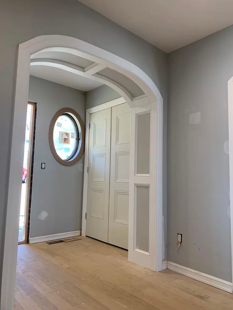 There is a round window in the middle of the room.