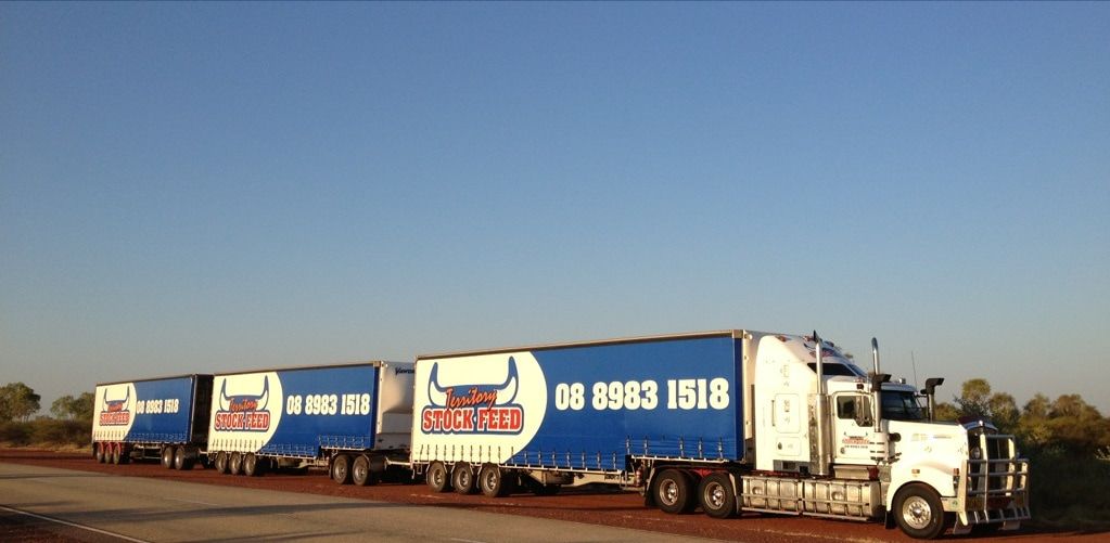 Three Boxes of Equine Black Are Stacked on Top of Each Other — Territory Stock Feed & Saddlery in Alice Springs, NT 