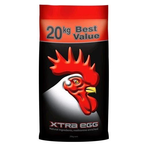 A bag of Xtra Egg chicken feed, black with a red rooster head and the text 