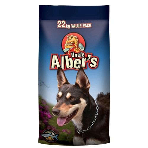 A bag of Uncle Alber's dog food, with a dog in the foreground wearing a chain collar — Territory Stock Feed & Saddlery in Alice Springs, NT