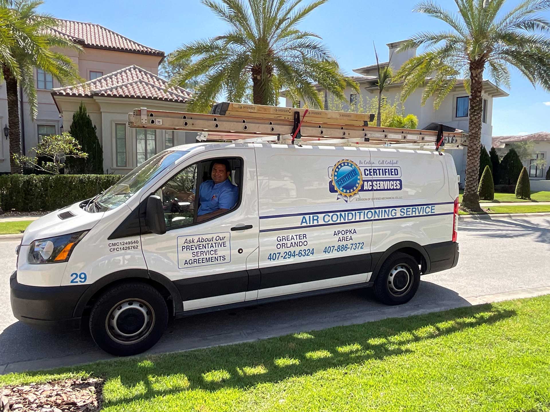 Certified AC Services dedicated team member sitting in a van in the Greater Orlando area.