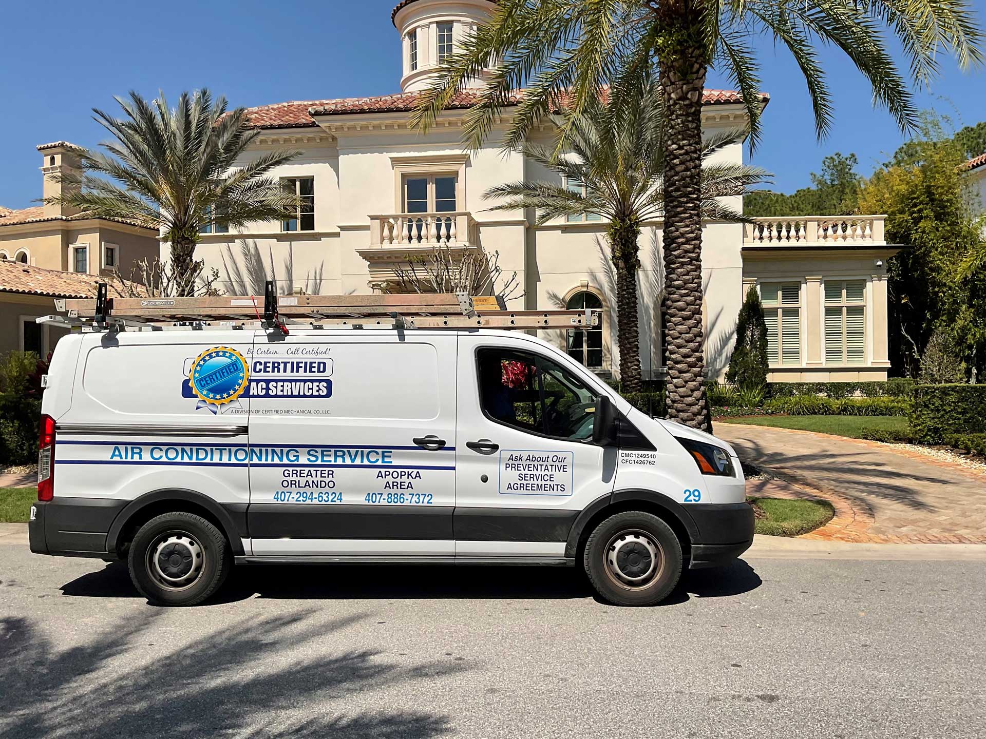 Certified AC Services Truck at Residential House for AC Repair in Apopka, FL A white Certified AC Services van is parked in front of a large mansion in the greater Orlando area