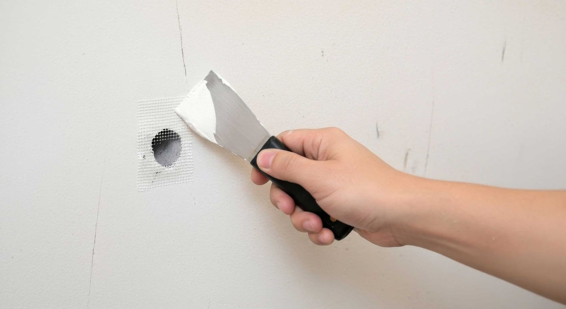 Plaster Wall Repair and Hole Patching Service in Brookwater