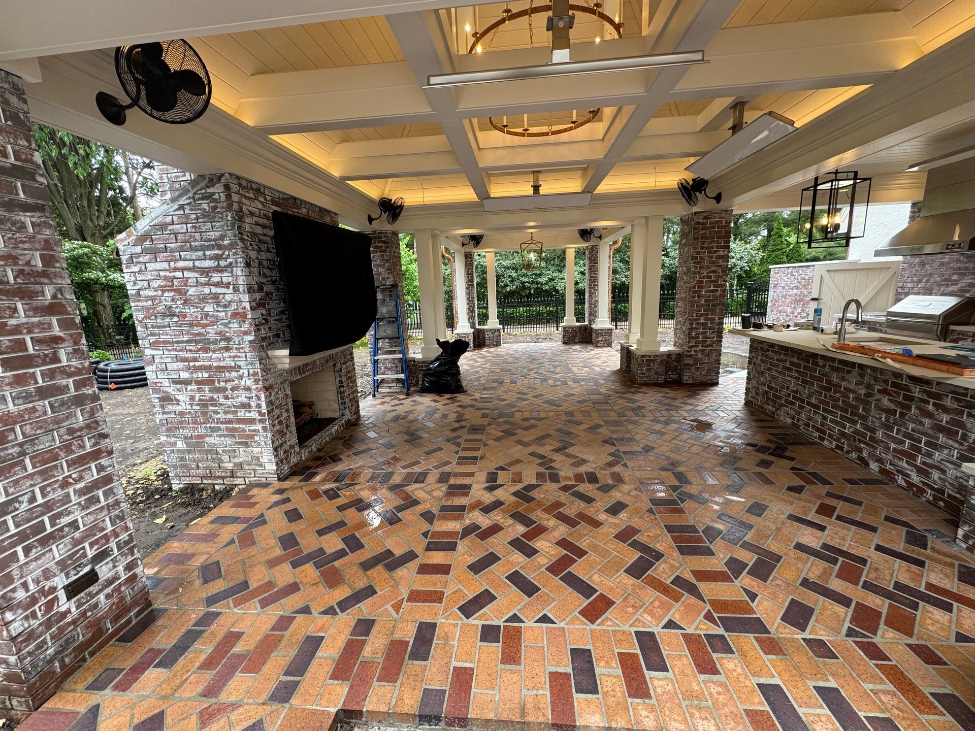 There is a brick floor in the middle of the room.