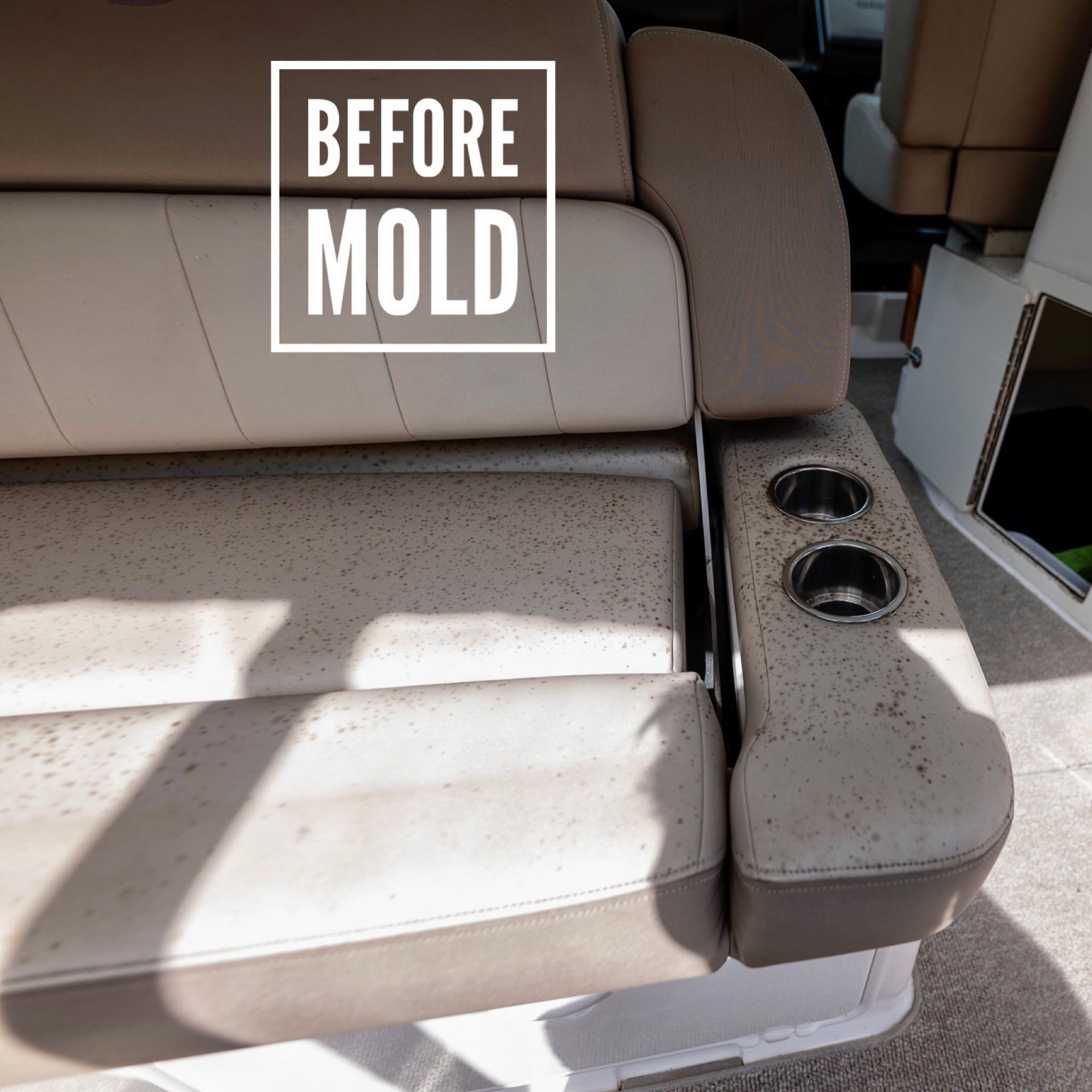 Boat seat stained with mold, two built-in cup holders,