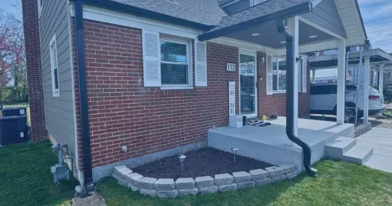 Gutter system replacement on single-family brick home in Maryland