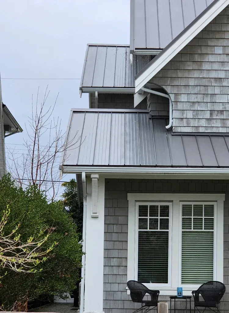 Standing seam metal roof installation on a residential home in Maryland.