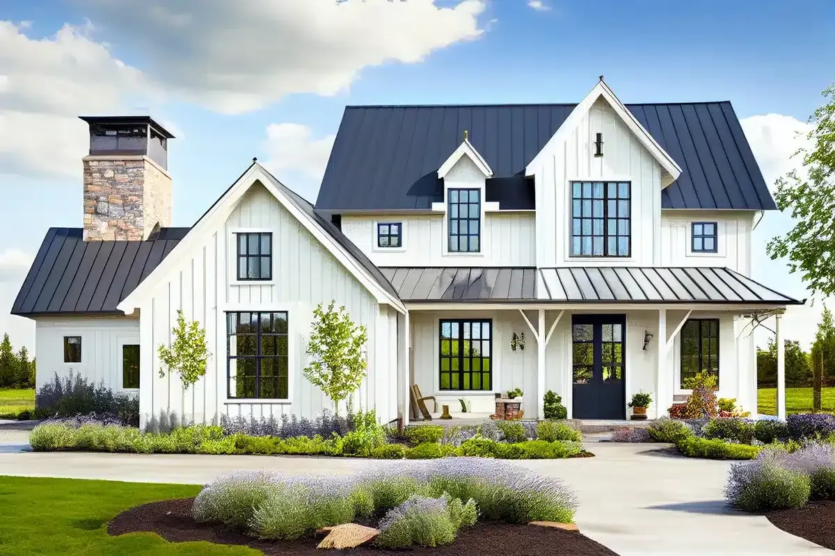 White farmhouse with black roof, windows, and door; landscaped front yard with lavender bushes.