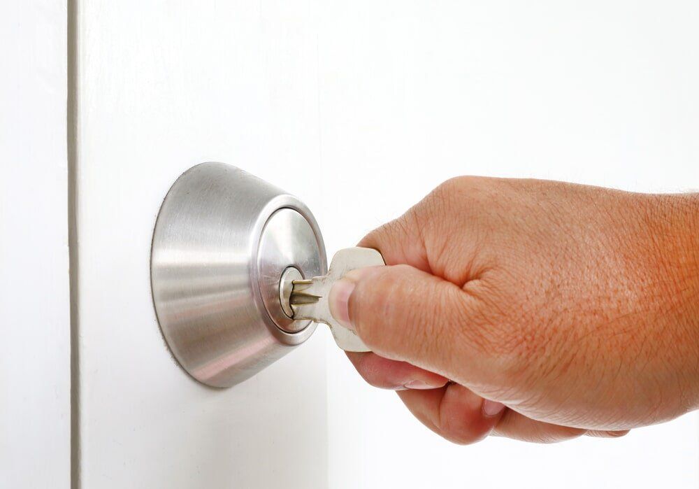 Inserting Key in the Keyhole — CQ Mobile Locksmith in Rockhampton, QLD