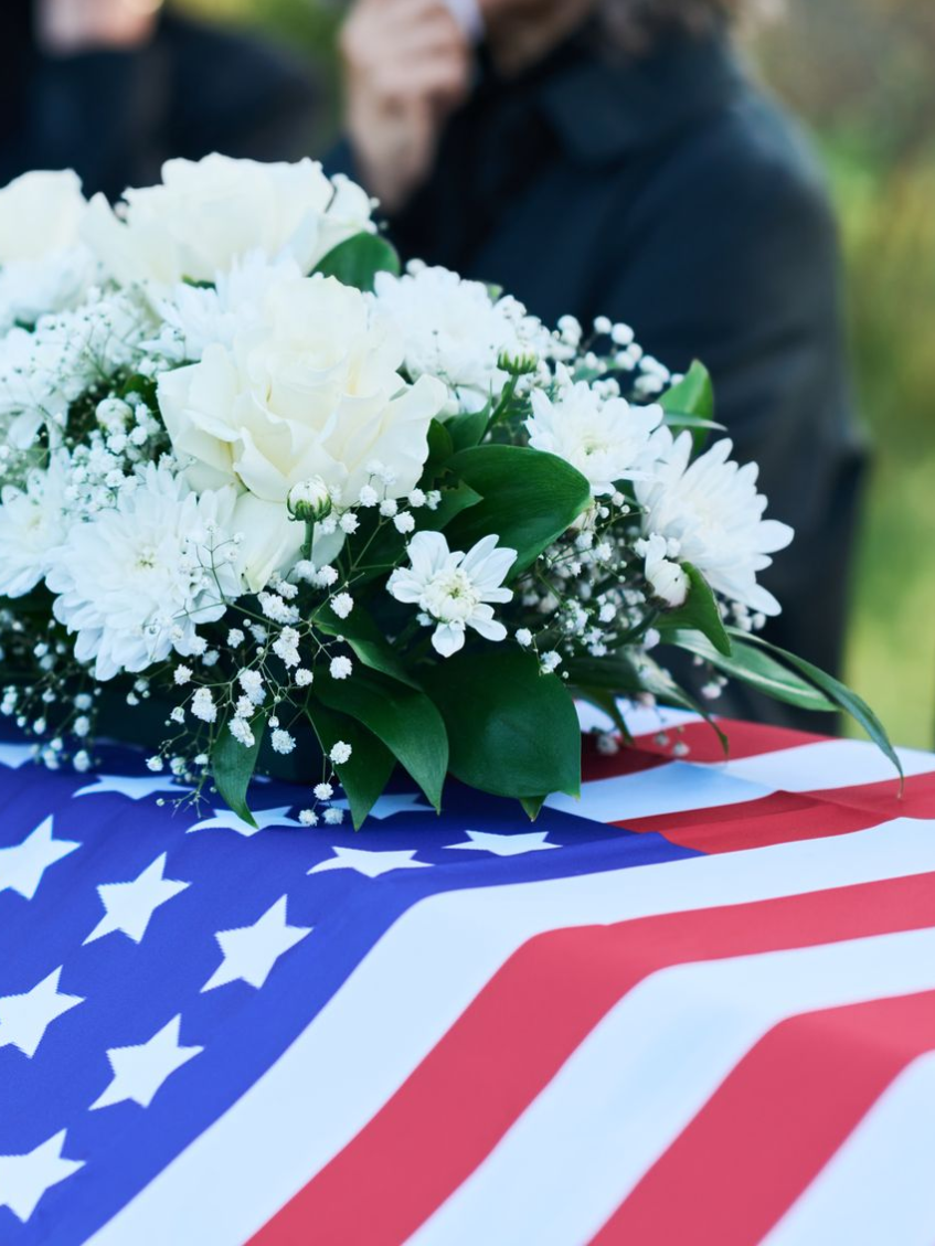 A lighthouse in the middle of a body of water