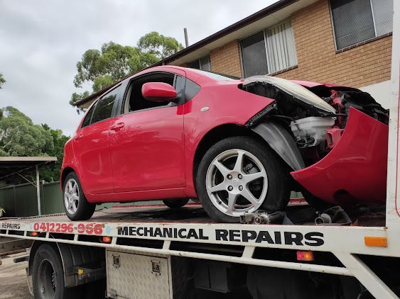 Towed red car | Blacktown, NSW | Eastern Creek Towing