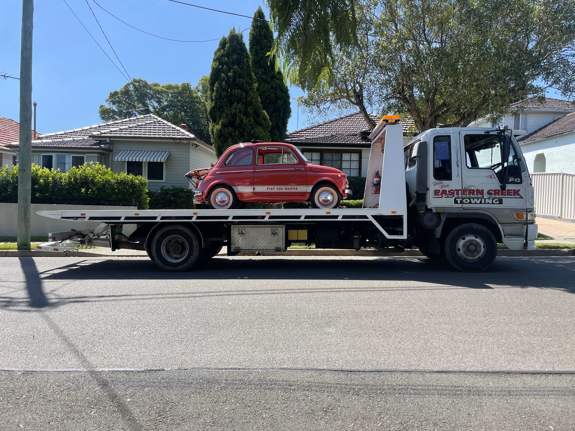 Tow truck operator towing a car | Blacktown, NSW | Eastern Creek Towing