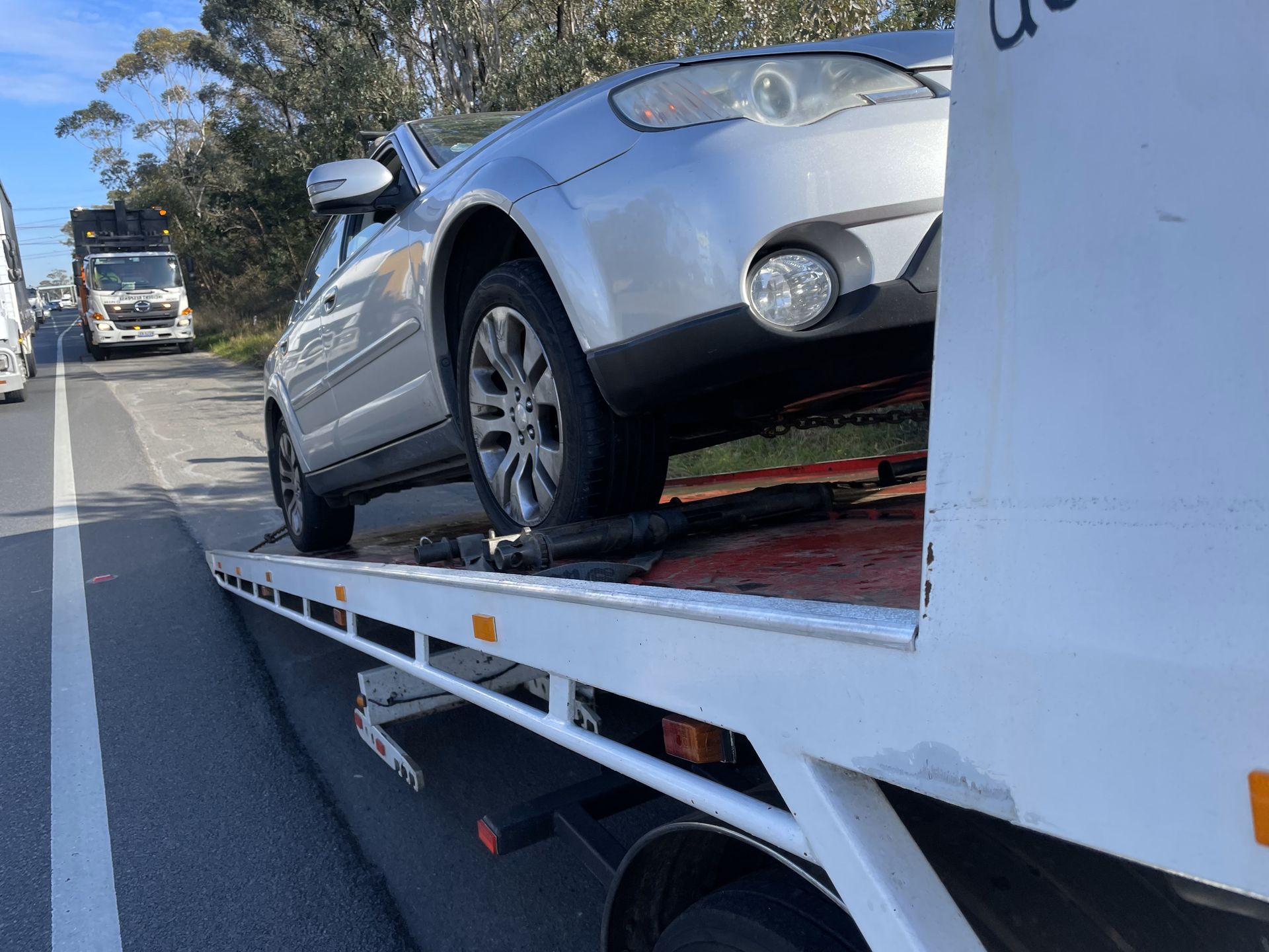 White truck towing smaller truck | Blacktown, NSW | Eastern Creek Towing