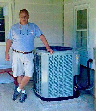 Worker Beside Air Conditioner – Hampden County – A1/AC