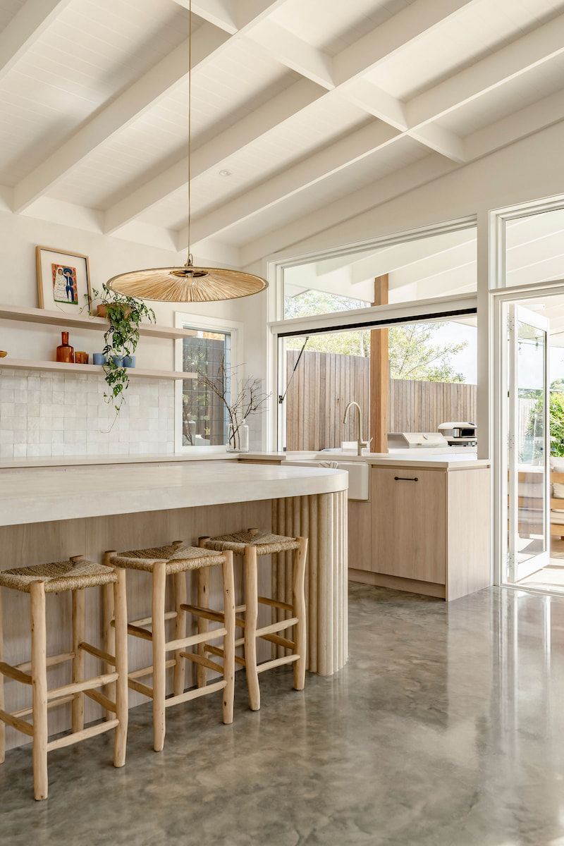 Light Wood Kitchen With Bar Stools — Goode By Design in Unanderra, NSW